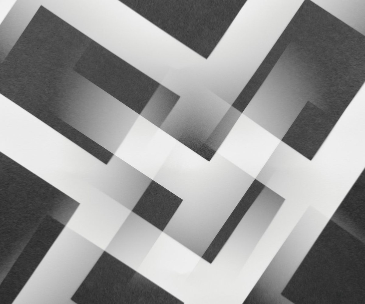 Light-colored metallic surface, geometric pattern