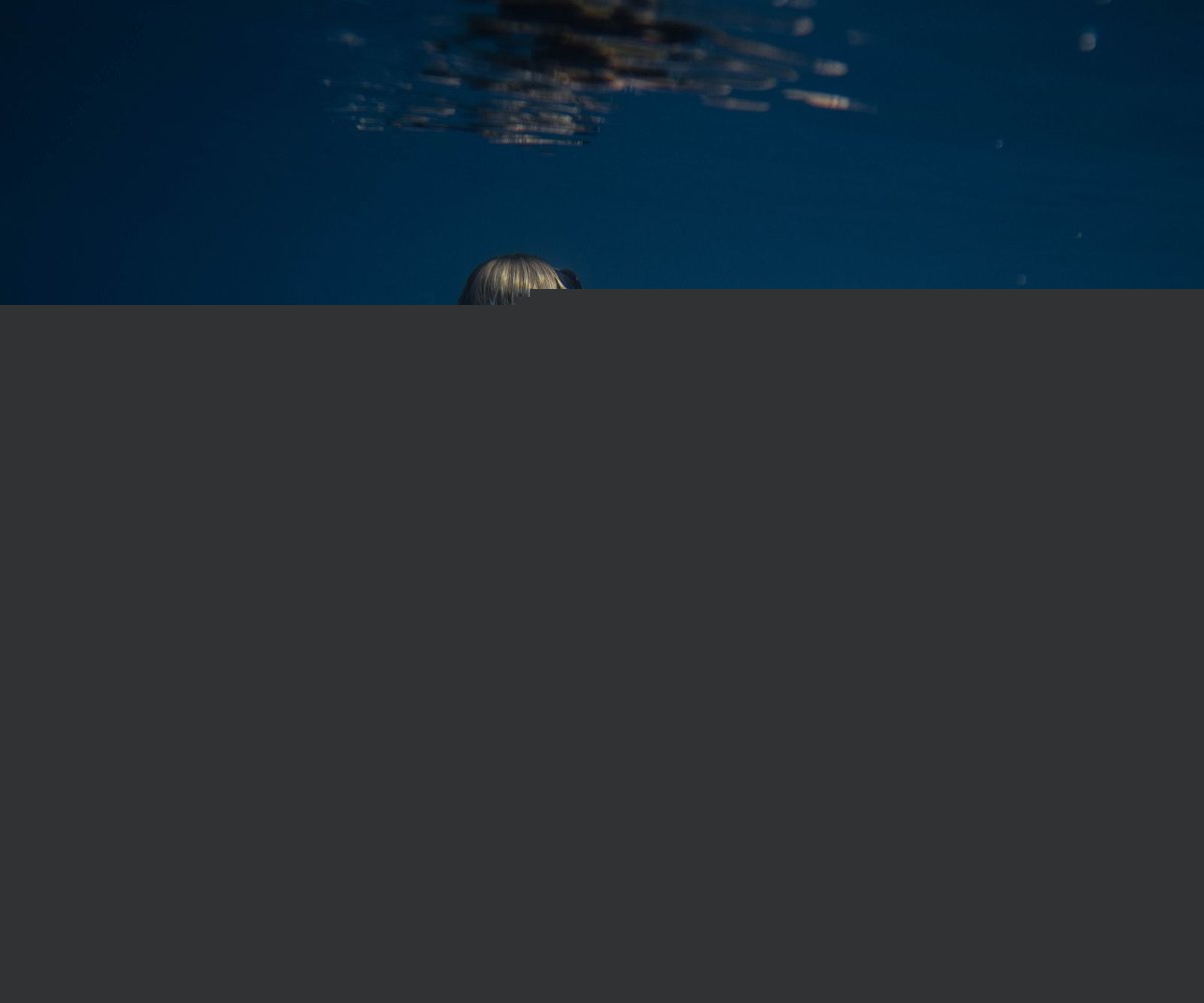 Swimmer underwater, close-up view